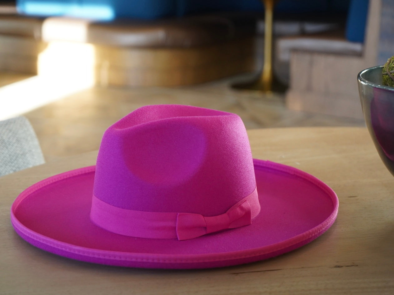 Dope Headwear's magenta colored curled brim hat.